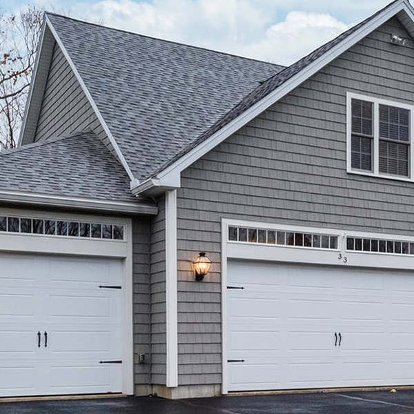 Luxury garage and residential roofing replacement