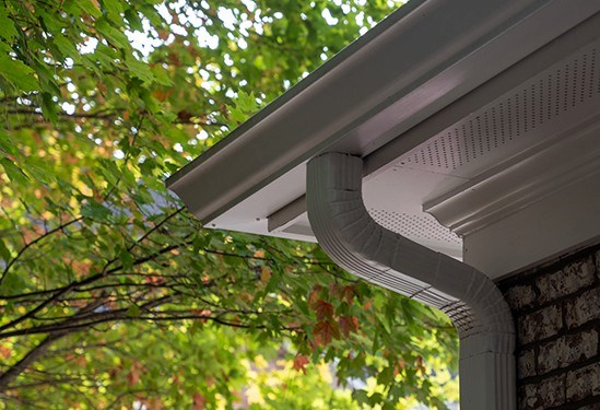 White aluminum gutters on house in Indianapolis